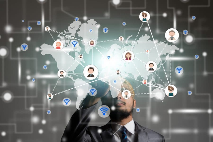Hand selecting social and multimedia icons