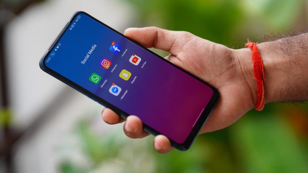 Hand holding an Android phone