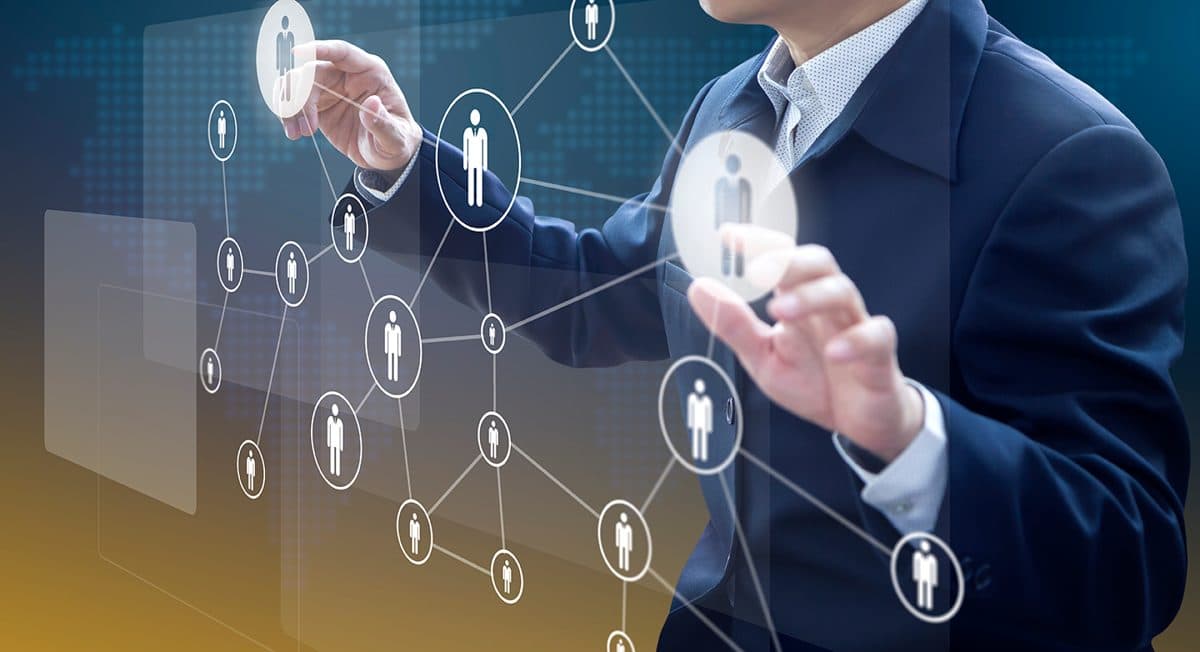 Consultant connecting people and technology on a digital network