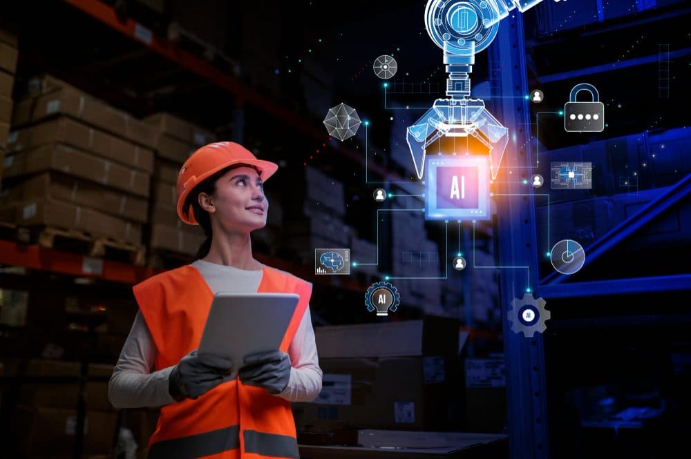 Warehouse worker with a tablet and connected IoT icons