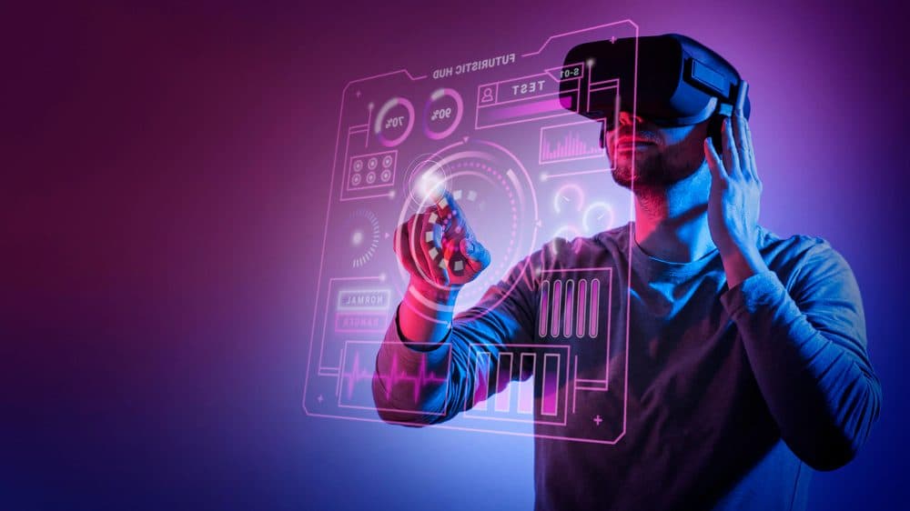 Engineer wearing VR glasses interacting with a virtual interface