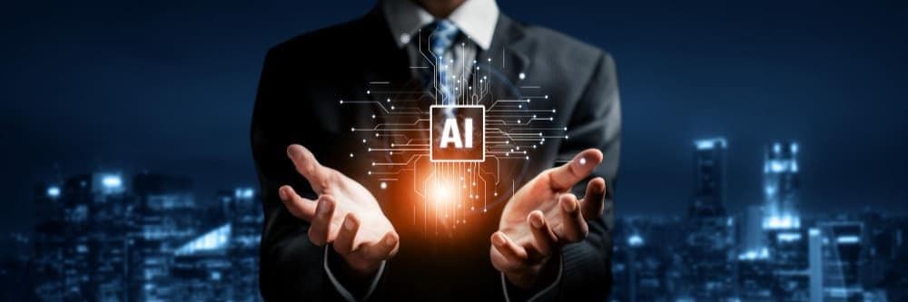 Business professional holding a glowing AI symbol